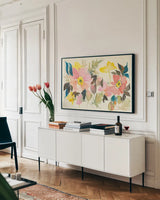 Pastel Garden I by Kristy Rice. shown as a framed stretched canvas in a living room above a console. Available as a archival giclee rolled canvas, fine art paper, or poster print. SKU 59876i.
