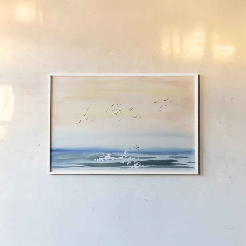 Sunset Shore by Kristy Rice. shown as a paper print in a white frame. Available as a archival giclee rolled canvas, fine art paper, or poster print. SKU 88609i.