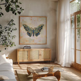 Gilded Wings IV by Krystal Adams. Shown in a natural wood frame in a cozy modern living room. Available as an archival giclee rolled canvas, fine art paper, or poster print. SKU 104882a.