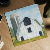 Little White Barn by Krystal Adams. Shown as a detailed flat fine art print, highlighting archival giclee quality. Available as an archival giclee rolled canvas, fine art paper, or poster print. SKU 102220a.
