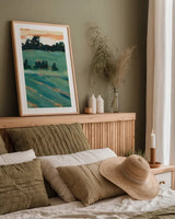 Rolling Hills I by Krystal Adams. shown as a paper print in a natural frame. Available as a archival giclee rolled canvas, fine art paper, or poster print. SKU 103608h.