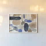 Leaves and Stones I by Laura Horn. shown as a paper print in a white frame. Available as a archival giclee rolled canvas, fine art paper, or poster print. SKU 78483i.