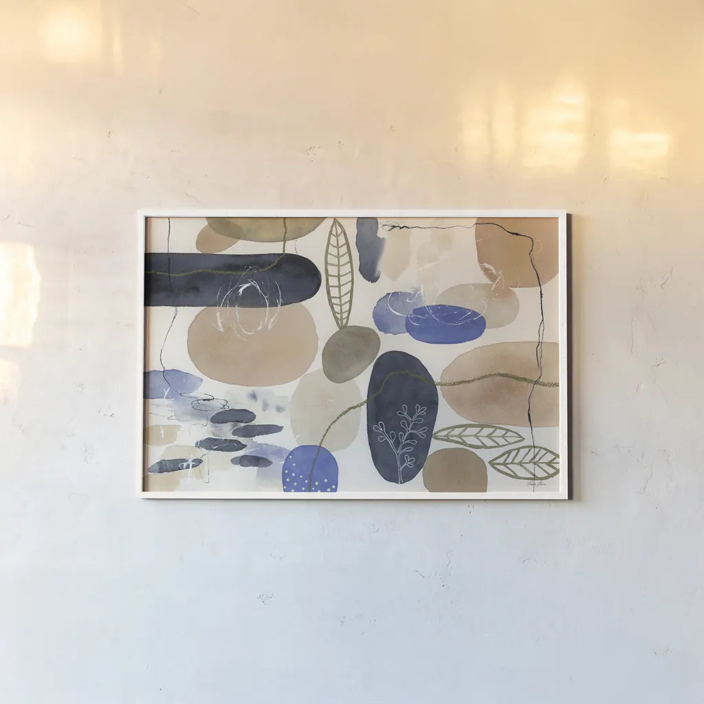 Leaves and Stones I by Laura Horn. shown as a paper print in a white frame. Available as a archival giclee rolled canvas, fine art paper, or poster print. SKU 78483i.