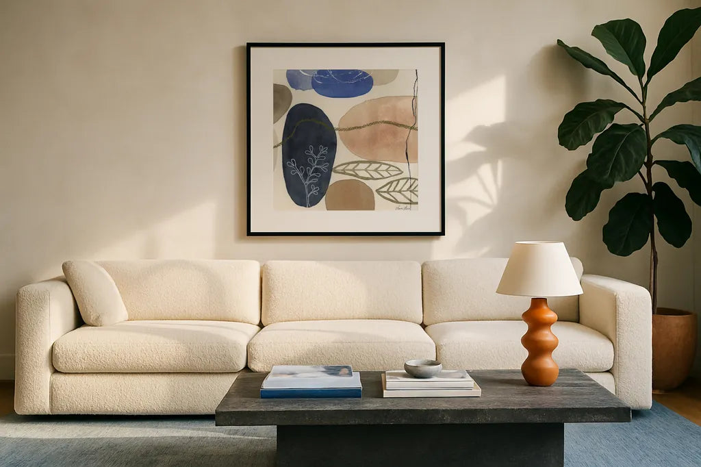 Leaves and Stones II by Laura Horn. Displayed in a glass frame with matte in a clean modern living room. Available as an archival giclee rolled canvas, fine art paper, or poster print. SKU 78484a.