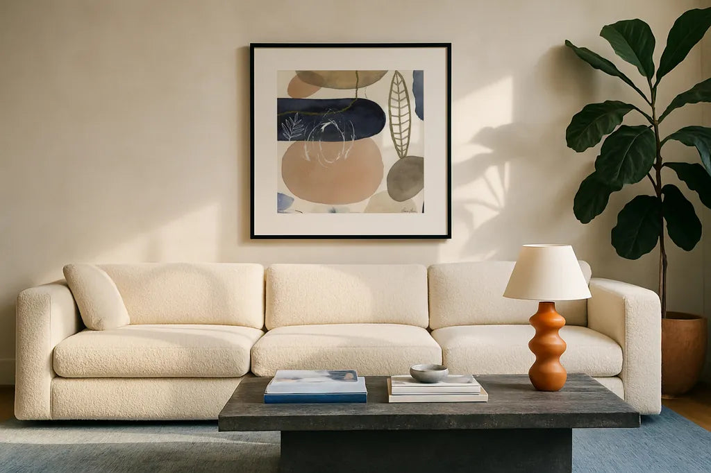 Leaves and Stones III by Laura Horn. Displayed in a glass frame with matte in a clean modern living room. Available as an archival giclee rolled canvas, fine art paper, or poster print. SKU 78485a.