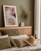 Nesting by Laura Horn. shown as a paper print in a natural frame. Available as a archival giclee rolled canvas, fine art paper, or poster print. SKU 91642h.