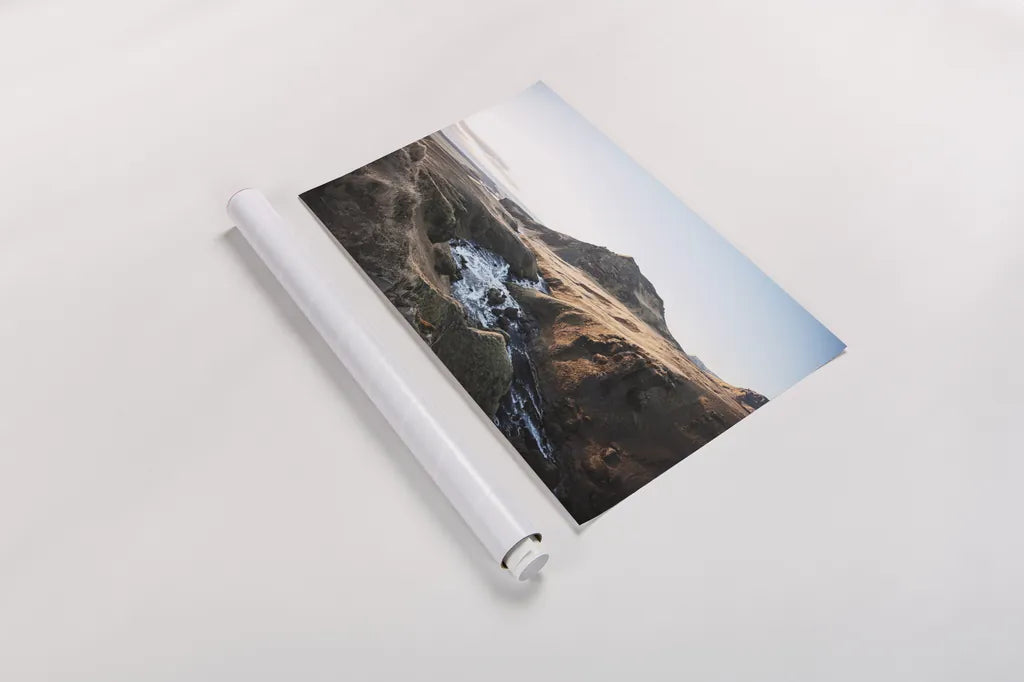 Above Skogafoss by Laura Marshall. shown as a rolled paper print. Available as archival giclee rolled canvas, fine art paper, or poster print. SKU 69903i.