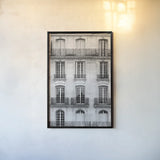 Across the Street I by Laura Marshall. shown as a paper print in a black flame. Available as a archival giclee rolled canvas, fine art paper, or poster print. SKU 21914h.
