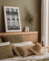 Across the Street II by Laura Marshall. shown as a paper print in a natural frame. Available as a archival giclee rolled canvas, fine art paper, or poster print. SKU 21915h.