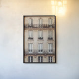 Across the Street II Neutral by Laura Marshall. shown as a paper print in a black flame. Available as a archival giclee rolled canvas, fine art paper, or poster print. SKU 53121h.