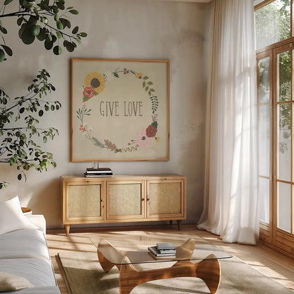 Autumn Garden Give Love by Laura Marshall. Shown in a natural wood frame in a cozy modern living room. Available as an archival giclee rolled canvas, fine art paper, or poster print. SKU 36818a.