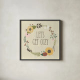 Autumn Garden Lets Get Cozy by Laura Marshall. Shown in a sleek black glass frame for a contemporary gallery look. Available as an archival giclee rolled canvas, fine art paper, or poster print. SKU 36817a.