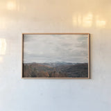 Autumn Hills I by Laura Marshall. shown as a paper print in a natural frame. Available as a archival giclee rolled canvas, fine art paper, or poster print. SKU 68099i.