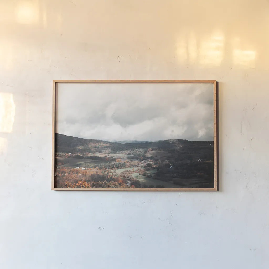 Autumn Hills II by Laura Marshall. shown as a paper print in a natural frame. Available as a archival giclee rolled canvas, fine art paper, or poster print. SKU 68100i.