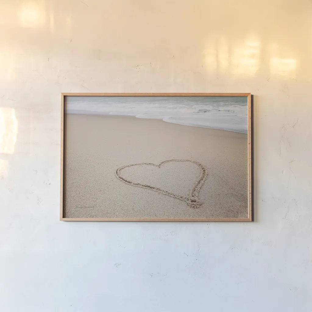 Beach Love I by Laura Marshall. shown as a paper print in a natural frame. Available as a archival giclee rolled canvas, fine art paper, or poster print. SKU 39637i.