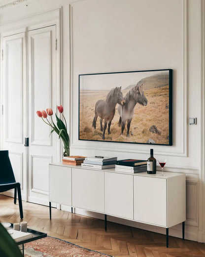 Bjarni and Imir I by Laura Marshall. shown as a framed stretched canvas in a living room above a console. Available as a archival giclee rolled canvas, fine art paper, or poster print. SKU 49806i.