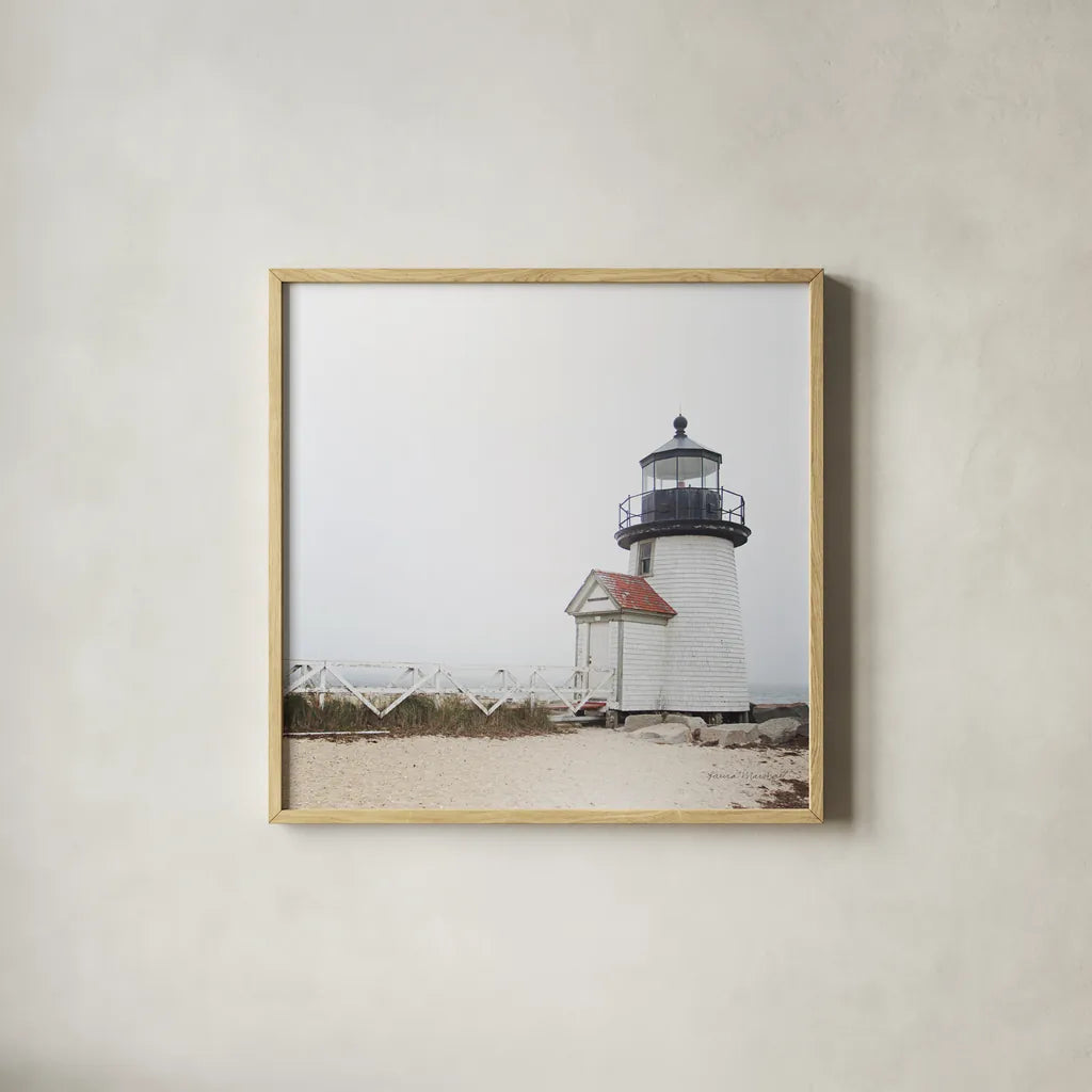 Brant Point Light by Laura Marshall. Shown in a natural wood glass frame for a timeless modern aesthetic. Available as an archival giclee rolled canvas, fine art paper, or poster print. SKU 38772a.