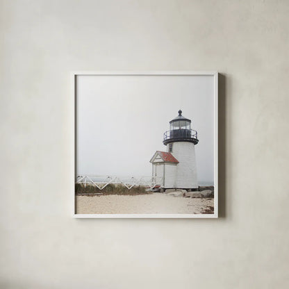 Brant Point Light by Laura Marshall. Shown in a crisp white glass frame for a clean and minimalist style. Available as an archival giclee rolled canvas, fine art paper, or poster print. SKU 38772a.