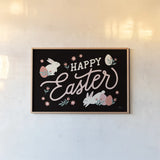 Bunny Kisses I Black by Laura Marshall. shown as a paper print in a natural frame. Available as a archival giclee rolled canvas, fine art paper, or poster print. SKU 81702i.