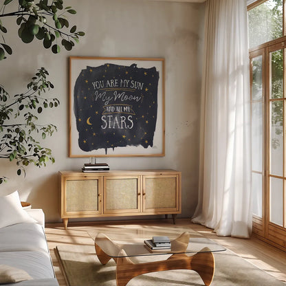 Celestial Love IV Sq by Laura Marshall. Shown in a natural wood frame in a cozy modern living room. Available as an archival giclee rolled canvas, fine art paper, or poster print. SKU 55622a.