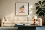 Christmas Sleigh by Laura Marshall. Displayed in a glass frame with matte in a clean modern living room. Available as an archival giclee rolled canvas, fine art paper, or poster print. SKU 80217a.