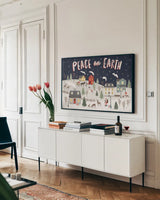 Christmas Village II by Laura Marshall. shown as a framed stretched canvas in a living room above a console. Available as a archival giclee rolled canvas, fine art paper, or poster print. SKU 48501i.