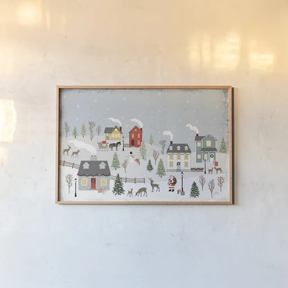 Christmas Village II Day by Laura Marshall. shown as a paper print in a natural frame. Available as a archival giclee rolled canvas, fine art paper, or poster print. SKU 68093i.