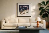 Christmas Village IV by Laura Marshall. Displayed in a glass frame with matte in a clean modern living room. Available as an archival giclee rolled canvas, fine art paper, or poster print. SKU 48503a.