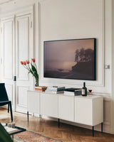 Crescent Bay II by Laura Marshall. shown as a framed stretched canvas in a living room above a console. Available as a archival giclee rolled canvas, fine art paper, or poster print. SKU 42968i.