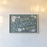 Daisy Garden I by Laura Marshall. shown as a paper print in a white frame. Available as a archival giclee rolled canvas, fine art paper, or poster print. SKU 80453i.