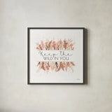 Desert Blooms I by Laura Marshall. Shown in a sleek black glass frame for a contemporary gallery look. Available as an archival giclee rolled canvas, fine art paper, or poster print. SKU 64842a.