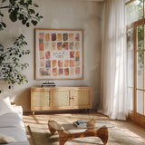 Desert Blooms VI by Laura Marshall. Shown in a natural wood frame in a cozy modern living room. Available as an archival giclee rolled canvas, fine art paper, or poster print. SKU 64847a.