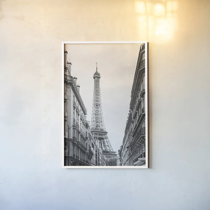 Eiffel Glimpse by Laura Marshall. shown as a paper print in a white frame. Available as a archival giclee rolled canvas, fine art paper, or poster print. SKU 25887h.