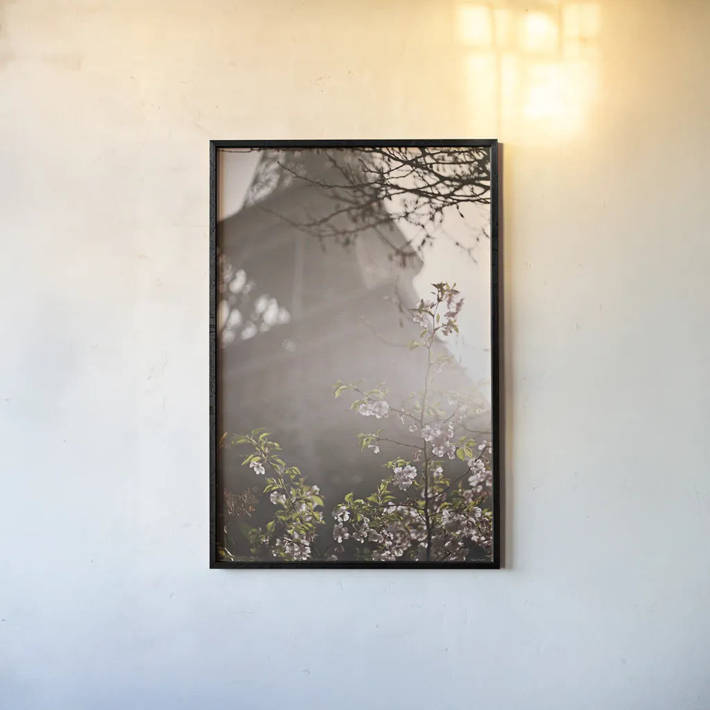 Eiffel Tower in Spring by Laura Marshall. shown as a paper print in a black flame. Available as a archival giclee rolled canvas, fine art paper, or poster print. SKU 17909h.