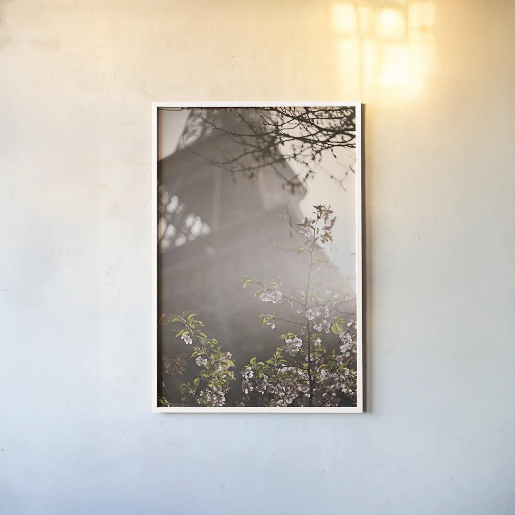 Eiffel Tower in Spring by Laura Marshall. shown as a paper print in a white frame. Available as a archival giclee rolled canvas, fine art paper, or poster print. SKU 17909h.
