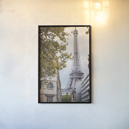 Eiffel View II by Laura Marshall. shown as a paper print in a black flame. Available as a archival giclee rolled canvas, fine art paper, or poster print. SKU 30543h.