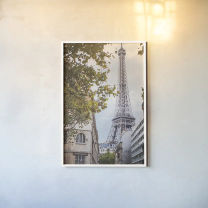 Eiffel View II by Laura Marshall. shown as a paper print in a white frame. Available as a archival giclee rolled canvas, fine art paper, or poster print. SKU 30543h.