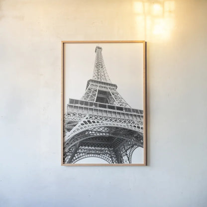 Eiffel up Close by Laura Marshall. shown as a paper print in a natural frame. Available as a archival giclee rolled canvas, fine art paper, or poster print. SKU 25888h.