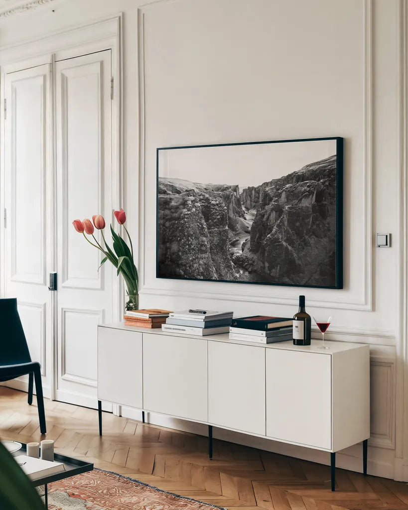 Fjadrargljufur by Laura Marshall. shown as a framed stretched canvas in a living room above a console. Available as a archival giclee rolled canvas, fine art paper, or poster print. SKU 64393i.