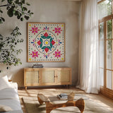 Floral Fiesta White Tile VIII by Laura Marshall. Shown in a natural wood frame in a cozy modern living room. Available as an archival giclee rolled canvas, fine art paper, or poster print. SKU 41527a.