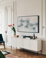 Flow with Gold by Laura Marshall. shown as a framed stretched canvas in a living room above a console. Available as a archival giclee rolled canvas, fine art paper, or poster print. SKU 32257i.