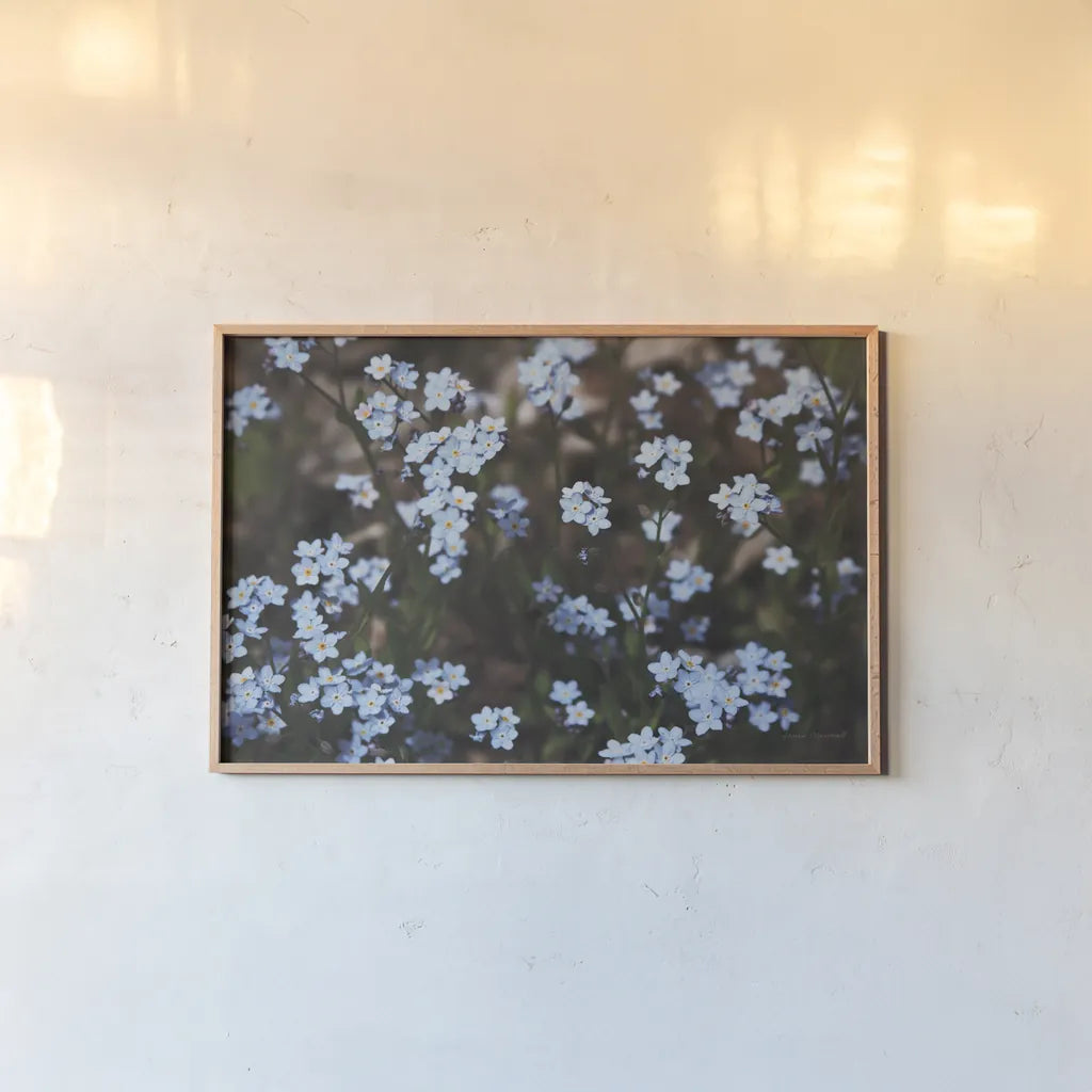 Forget Me Nots II by Laura Marshall. shown as a paper print in a natural frame. Available as a archival giclee rolled canvas, fine art paper, or poster print. SKU 63260i.