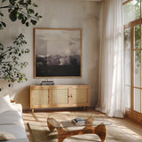 Framed Landscape IV by Laura Marshall. Shown in a natural wood frame in a cozy modern living room. Available as an archival giclee rolled canvas, fine art paper, or poster print. SKU 25137a.