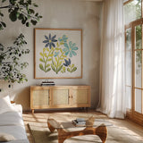 Garden Getaway Flowers II by Laura Marshall. Shown in a natural wood frame in a cozy modern living room. Available as an archival giclee rolled canvas, fine art paper, or poster print. SKU 34442a.