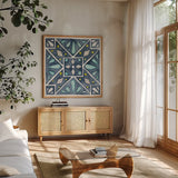 Garden Getaway Tile IX Blue by Laura Marshall. Shown in a natural wood frame in a cozy modern living room. Available as an archival giclee rolled canvas, fine art paper, or poster print. SKU 34461a.