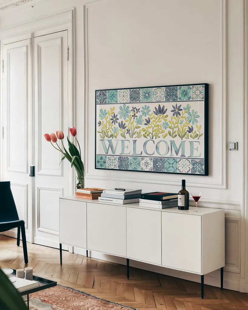 Garden Getaway Welcome by Laura Marshall. shown as a framed stretched canvas in a living room above a console. Available as a archival giclee rolled canvas, fine art paper, or poster print. SKU 34480i.