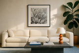 Garden Succulent I by Laura Marshall. Displayed in a glass frame with matte in a clean modern living room. Available as an archival giclee rolled canvas, fine art paper, or poster print. SKU 20824a.