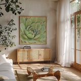 Garden Succulents IV Color by Laura Marshall. Shown in a natural wood frame in a cozy modern living room. Available as an archival giclee rolled canvas, fine art paper, or poster print. SKU 33280a.