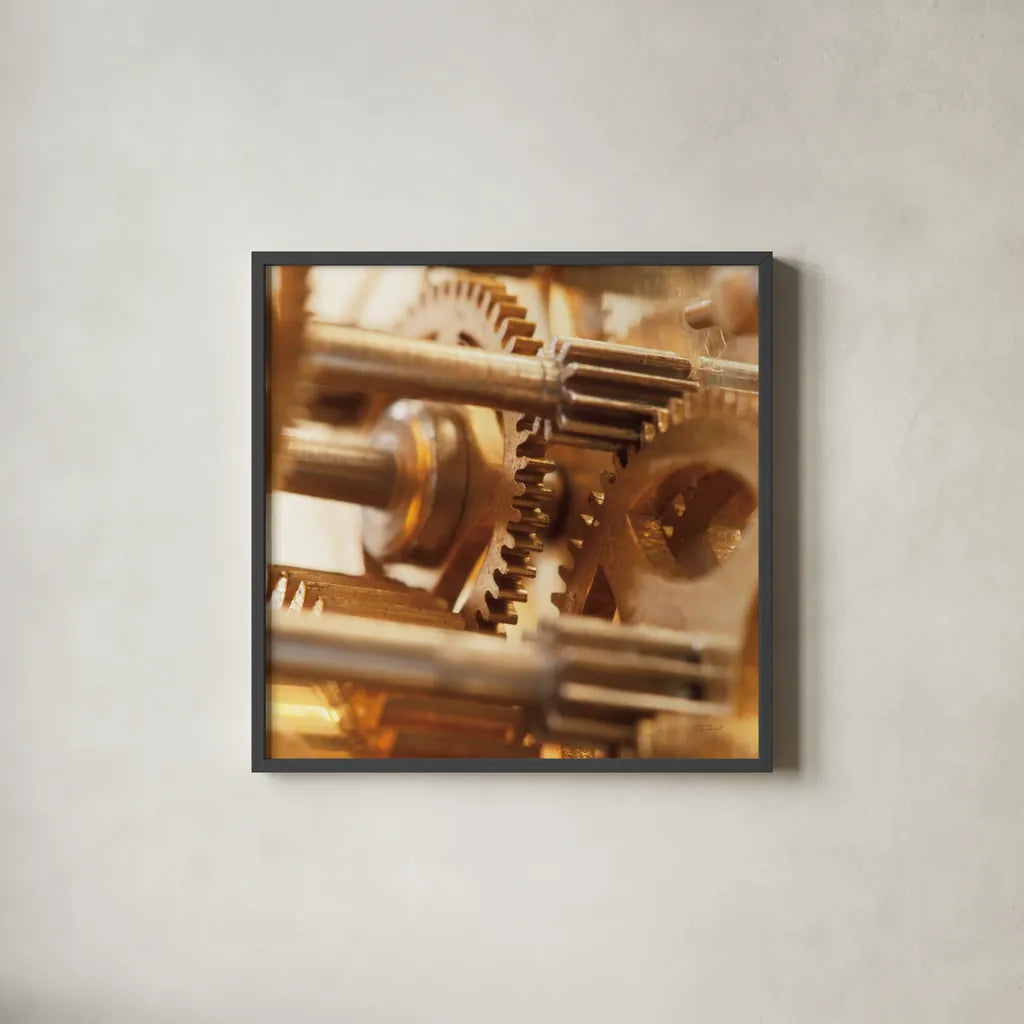Gilded Gears II by Laura Marshall. Shown in a sleek black glass frame for a contemporary gallery look. Available as an archival giclee rolled canvas, fine art paper, or poster print. SKU 25870a.