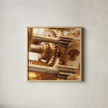 Gilded Gears II by Laura Marshall. Shown in a natural wood glass frame for a timeless modern aesthetic. Available as an archival giclee rolled canvas, fine art paper, or poster print. SKU 25870a.